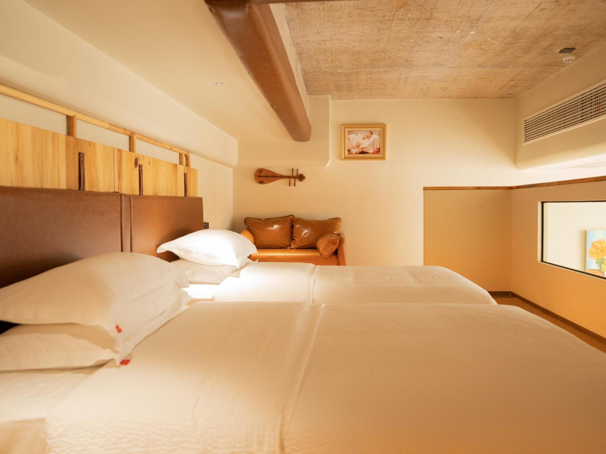 ז'אנגג'יאג'י Patio Spring Holiday Inn -- Free Round Trip Pick-Up Service --Panoramic View Of Tianmen Mount מראה חיצוני תמונה