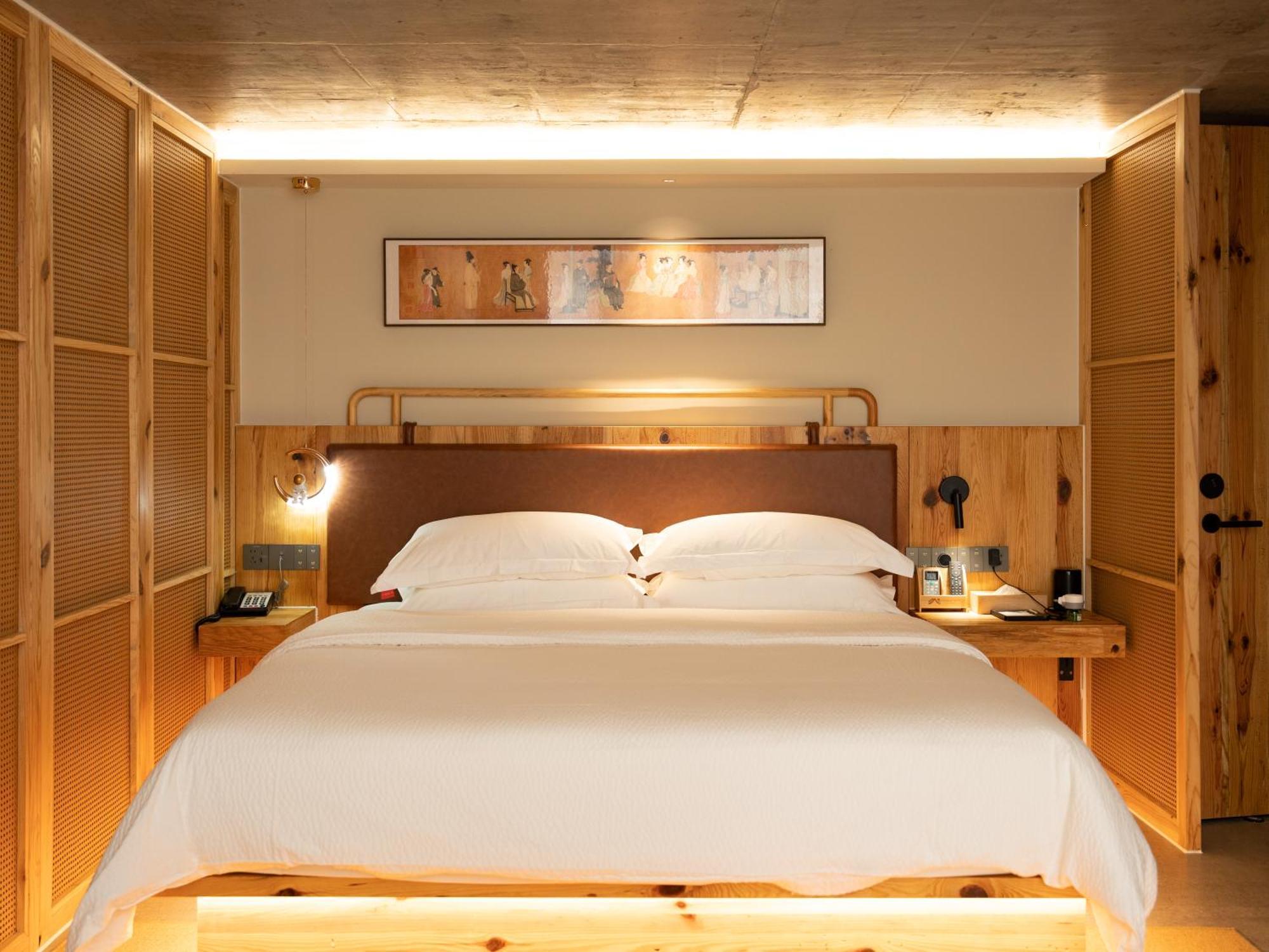 ז'אנגג'יאג'י Patio Spring Holiday Inn -- Free Round Trip Pick-Up Service --Panoramic View Of Tianmen Mount מראה חיצוני תמונה