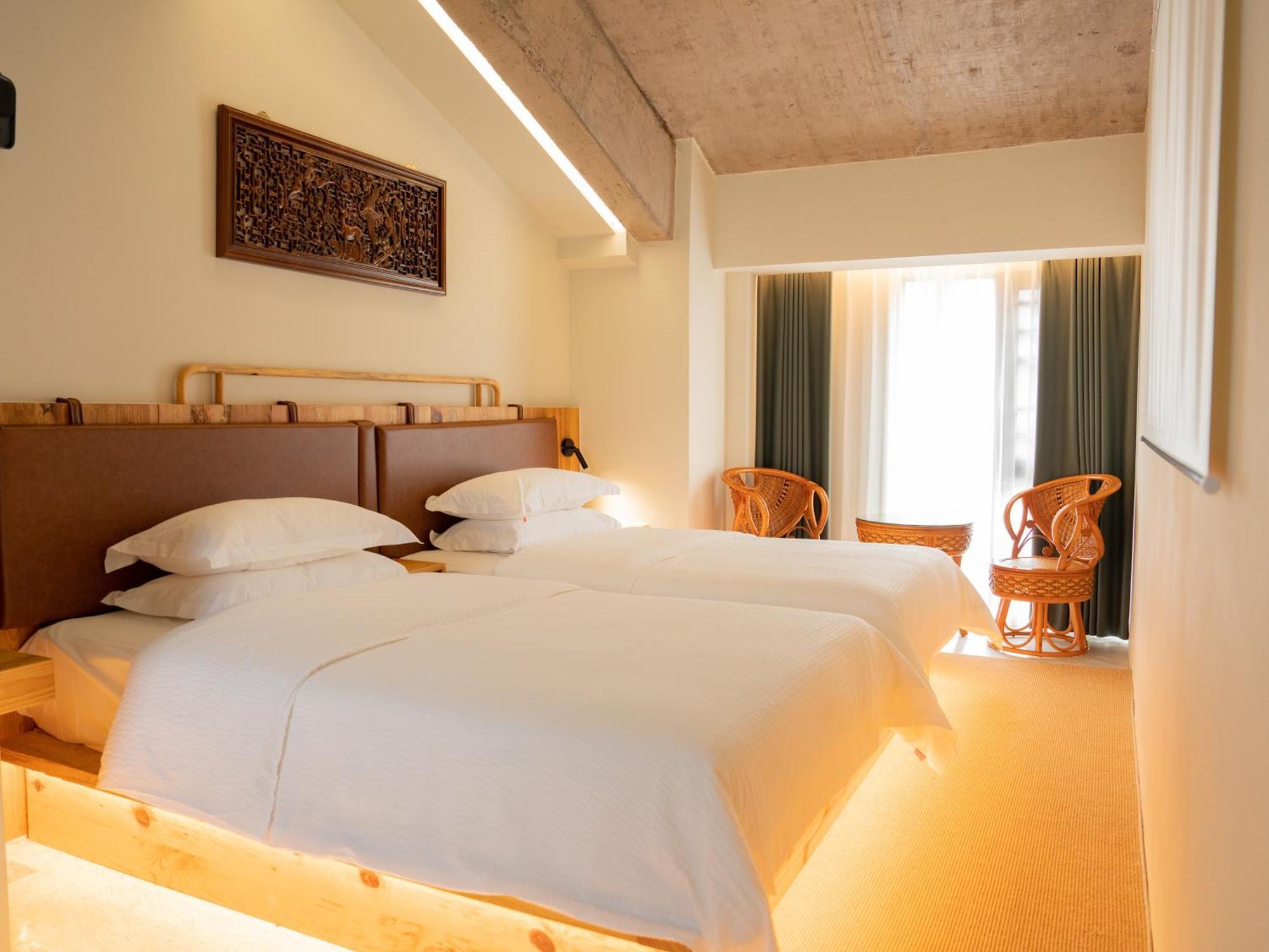ז'אנגג'יאג'י Patio Spring Holiday Inn -- Free Round Trip Pick-Up Service --Panoramic View Of Tianmen Mount מראה חיצוני תמונה